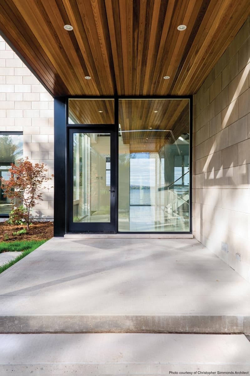 Inswing entrance doors, Direct set transoms and sidelites,Extruded aluminum clad exterior, Coal Black fluoropolymer finish