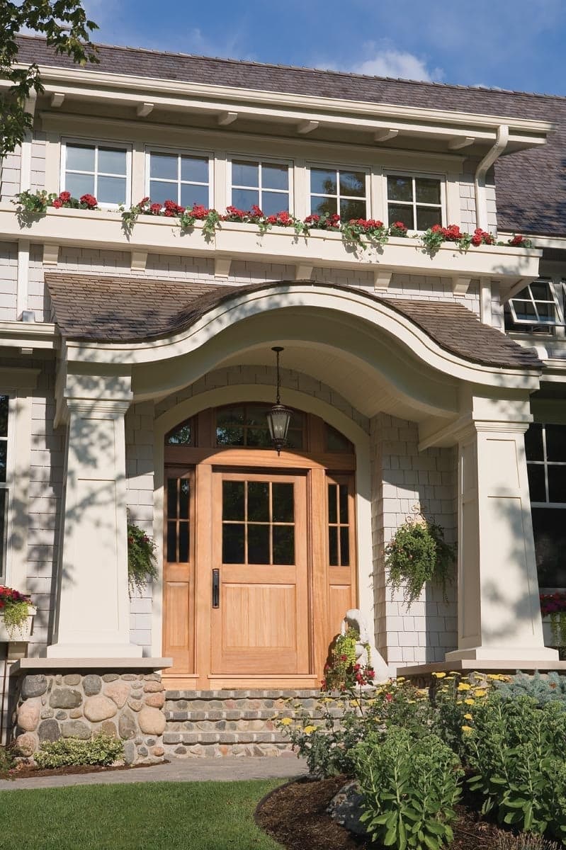 Heritage Series craftsman door with sidelites and transom
Mahogany wood species
Custom raised door panel, custom exterior finish, and Oil-Rubbed hardware