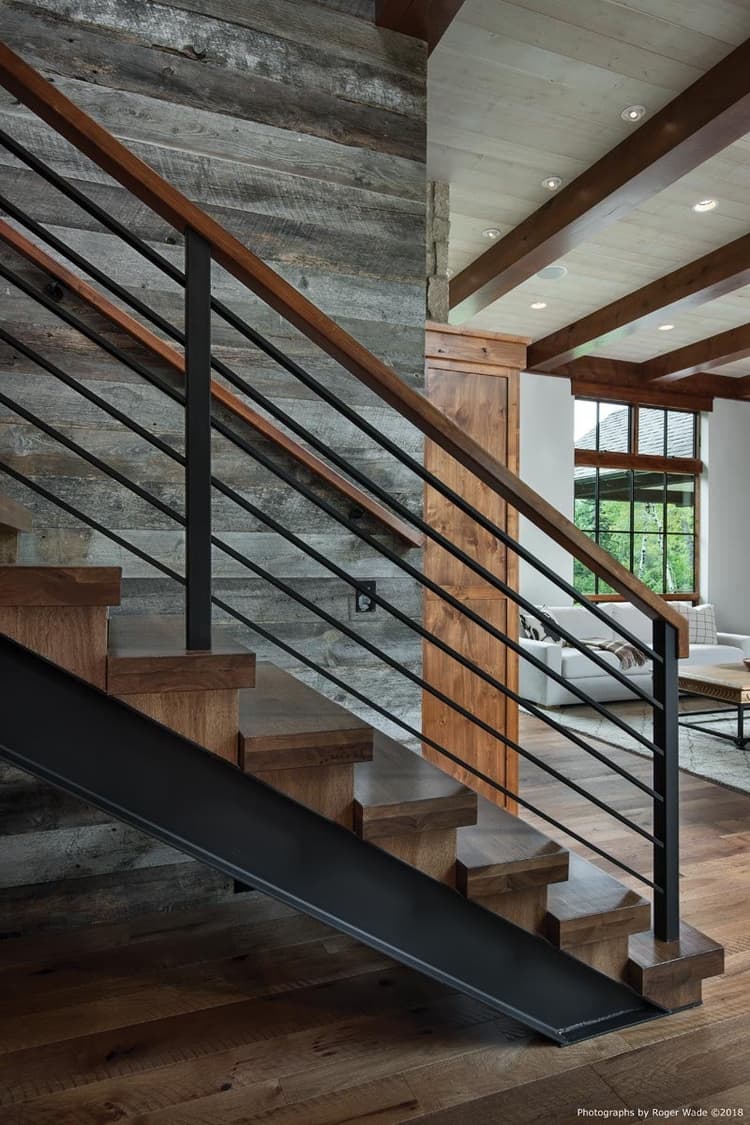 open riser stairs, European-styled cabinetry and steel sash windows.